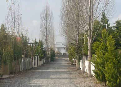 زمین بافت مسکونی با سند تکبرگ در شهرک جنگلی با نگهبانی