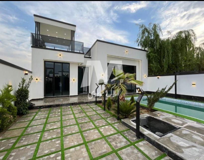 خرید ویلا باغ ۴۰۰ متری سرسبز استخردار رزک چمستان | 400 متر